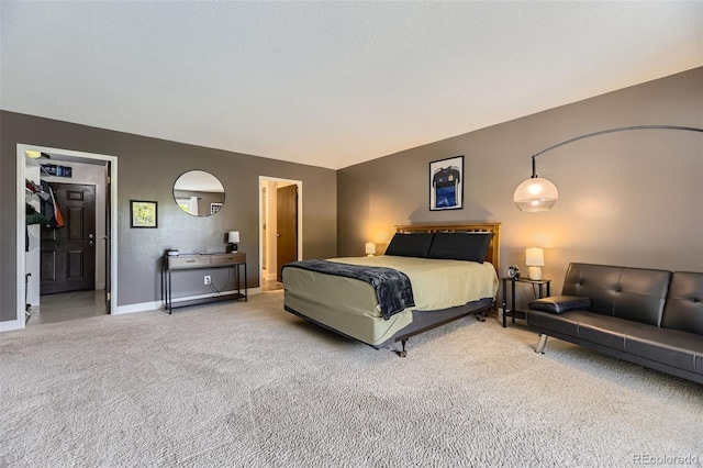 7020 E Girard Ave Unit 206, Denver, CO 80224 - carpeted bedroom with baseboards