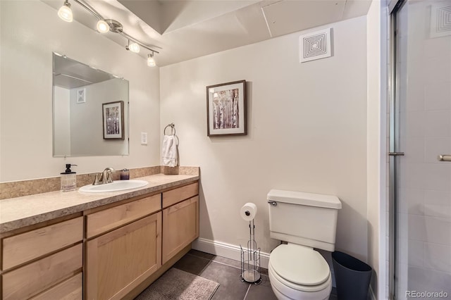 7020 E Girard Ave Unit 206, Denver, CO 80224 - bathroom with vanity, tile patterned flooring, and an enclosed shower