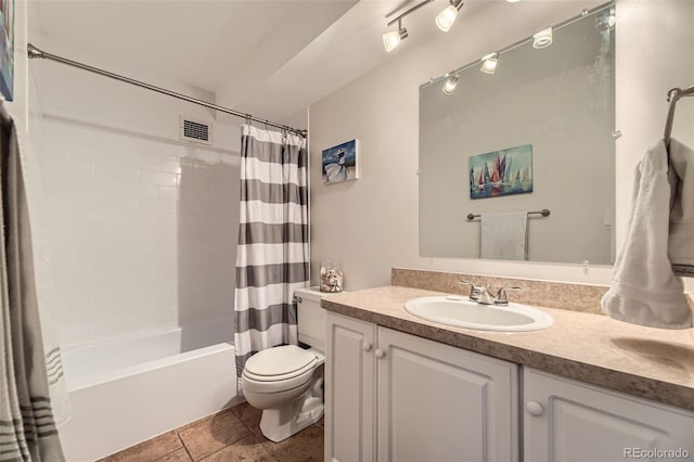 7020 E Girard Ave Unit 206, Denver, CO 80224 - bathroom with vanity, shower / bath combo, and tile patterned flooring