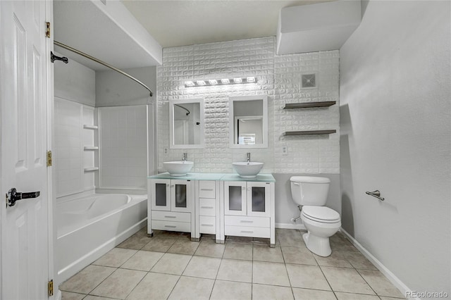 full bathroom featuring toilet, tile patterned flooring, vanity, and tub / shower combination