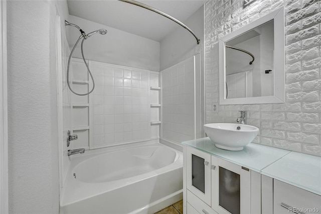 bathroom with vanity and tub / shower combination