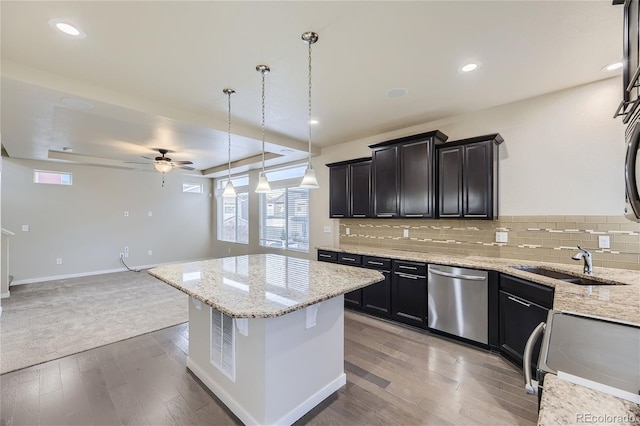 2564 Sweet Wind Ave, Castle Rock, CO 80109 - kitchen featuring stainless steel dishwasher, electric stove, a sink, ceiling fan, and wood finished floors