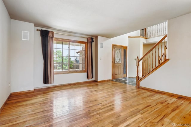 9920 Glenellen Dr, Peyton, CO 80831 - interior space with stairs, baseboards, and wood finished floors