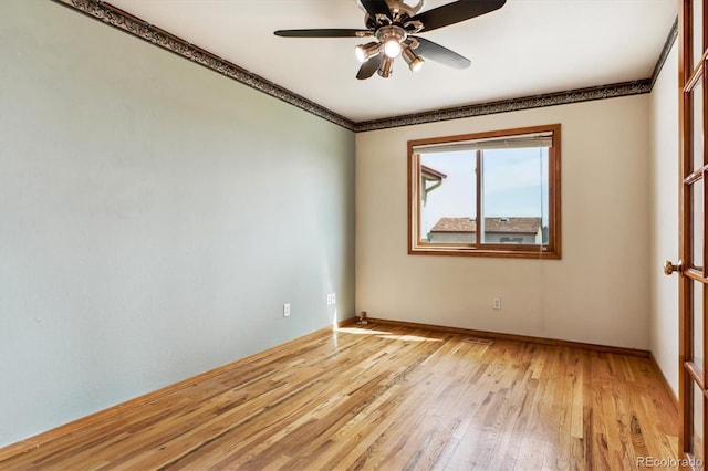 9920 Glenellen Dr, Peyton, CO 80831 - spare room with light wood-style flooring, crown molding, baseboards, and a ceiling fan