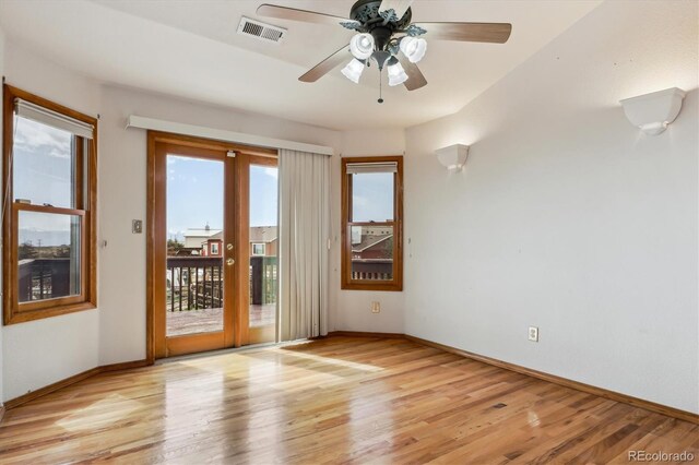 9920 Glenellen Dr, Peyton, CO 80831 - spare room featuring light wood-style flooring, baseboards, a ceiling fan, and visible vents