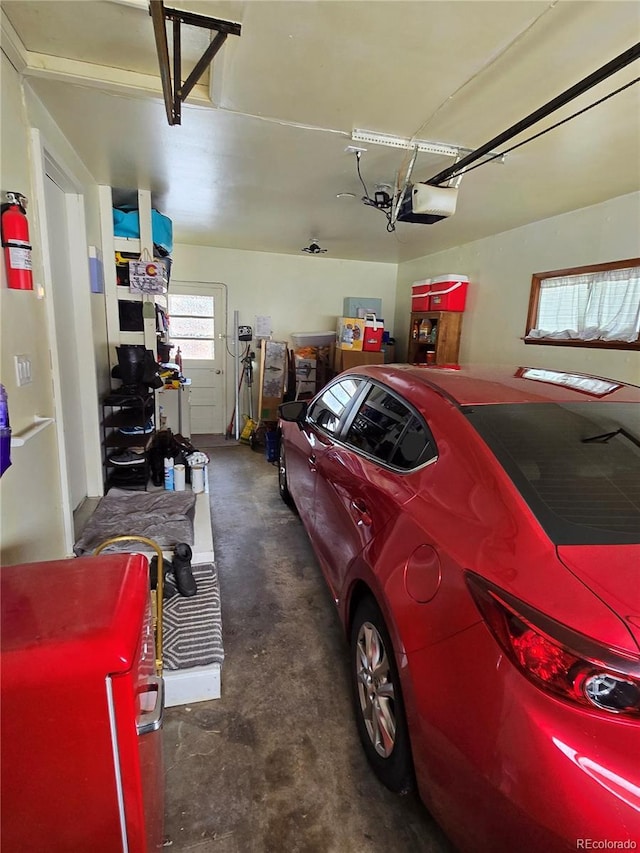 garage featuring a garage door opener