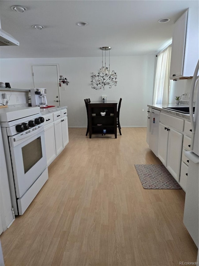 kitchen with dishwasher, white cabinetry, light hardwood / wood-style floors, decorative light fixtures, and white gas stove