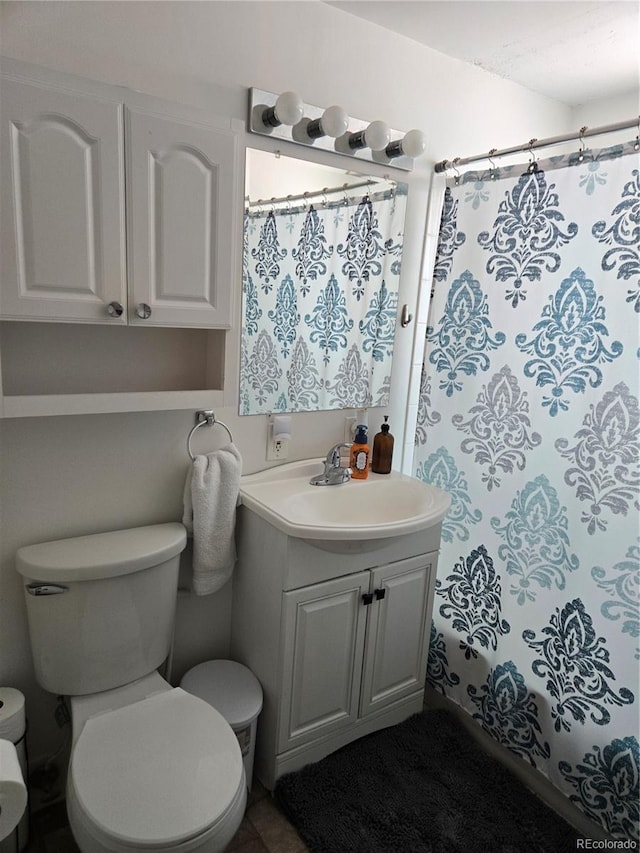 bathroom with vanity and toilet