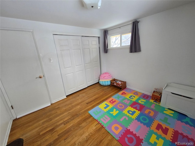 game room with hardwood / wood-style flooring