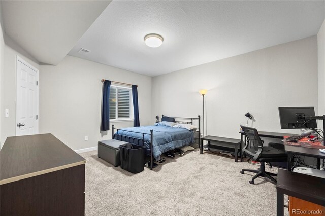 224 S Jackson Gap Way, Aurora, CO 80018 - carpeted bedroom featuring visible vents and baseboards