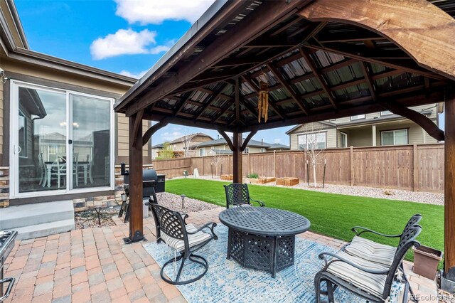 224 S Jackson Gap Way, Aurora, CO 80018 - view of patio featuring a fenced backyard and a gazebo