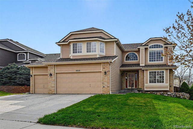 9515 Dolton Way, Highlands Ranch, CO 80126 - view of front facade with driveway, a front yard, brick siding, a garage, and a shingled roof