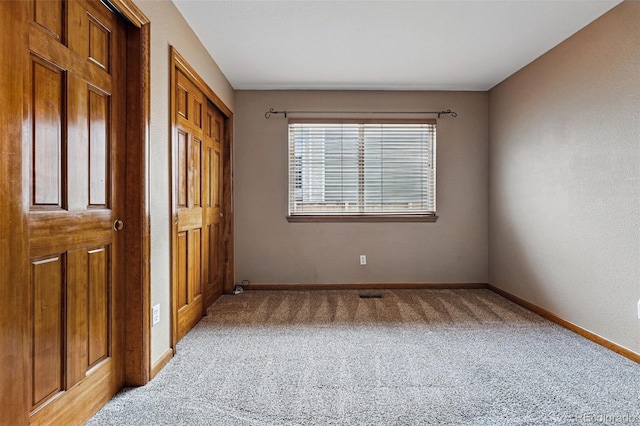 9515 Dolton Way, Highlands Ranch, CO 80126 - unfurnished bedroom featuring light carpet, baseboards, and a closet