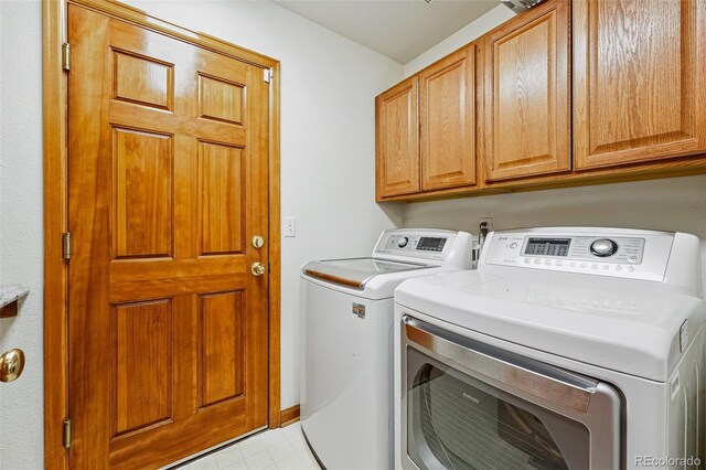 9515 Dolton Way, Highlands Ranch, CO 80126 - clothes washing area with washing machine and clothes dryer and cabinet space