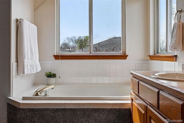9515 Dolton Way, Highlands Ranch, CO 80126 - bathroom featuring a garden tub and vanity