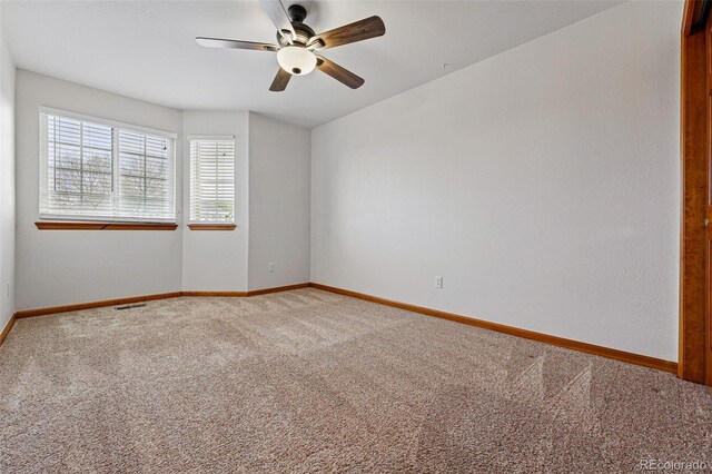 9515 Dolton Way, Highlands Ranch, CO 80126 - carpeted spare room with ceiling fan and baseboards