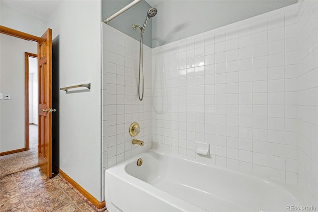 9515 Dolton Way, Highlands Ranch, CO 80126 - bathroom with baseboards and  shower combination