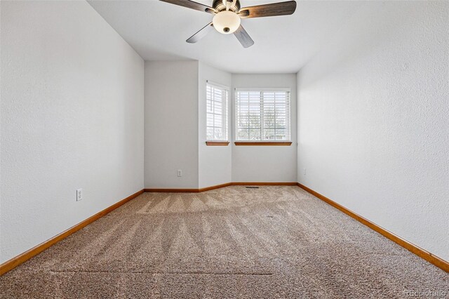 9515 Dolton Way, Highlands Ranch, CO 80126 - unfurnished room featuring carpet floors, baseboards, ceiling fan, and a textured wall