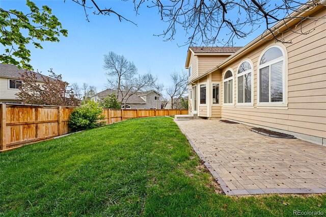9515 Dolton Way, Highlands Ranch, CO 80126 - view of yard with a patio area