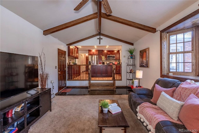 living room with vaulted ceiling with beams and light colored carpet