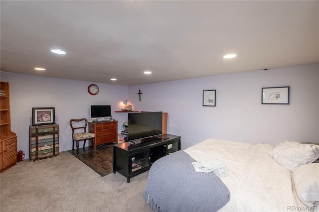 bedroom featuring light carpet