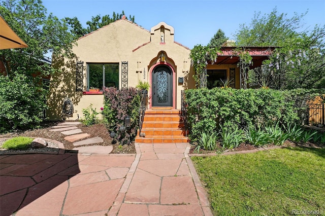 1332 Ash St, Denver, CO 80220 - mediterranean / spanish-style house with stucco siding