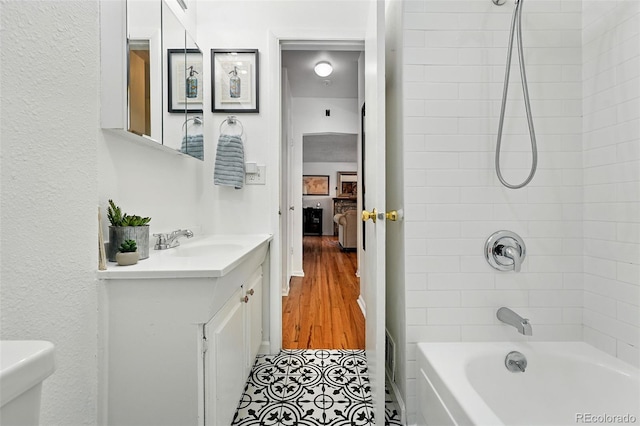 1332 Ash St, Denver, CO 80220 - bathroom with vanity and shower / bathtub combination