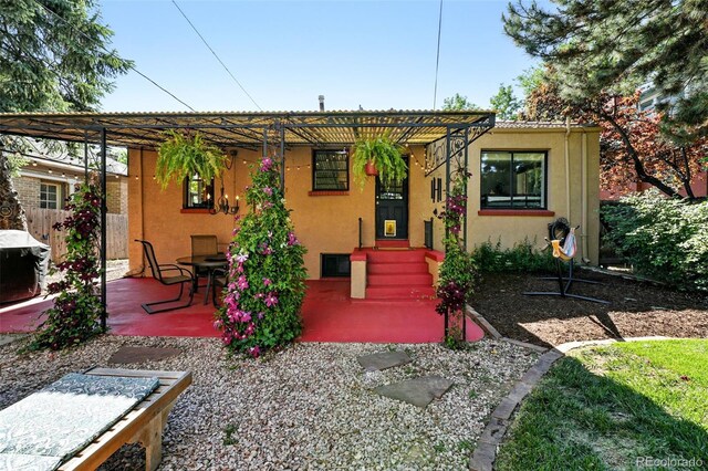 1332 Ash St, Denver, CO 80220 - view of front of home featuring stucco siding