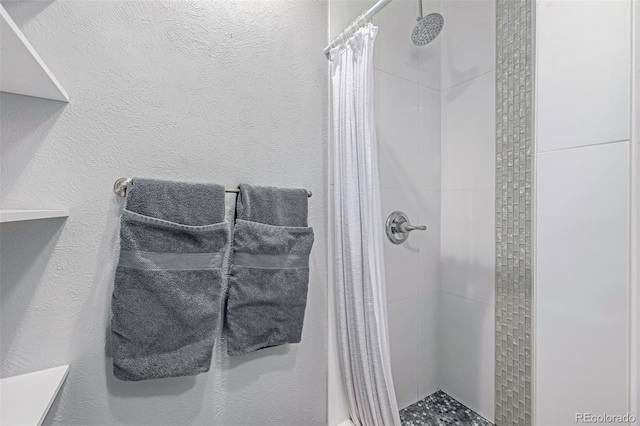 bathroom featuring a stall shower