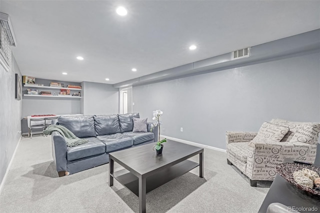 living room featuring carpet flooring, recessed lighting, and baseboards