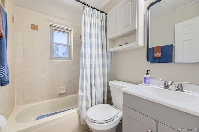 bathroom featuring vanity, toilet, and shower / bathtub combination with curtain