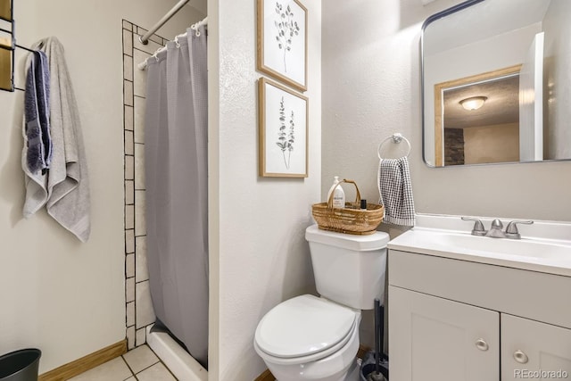 bathroom with vanity, a shower with shower curtain, tile patterned flooring, and toilet