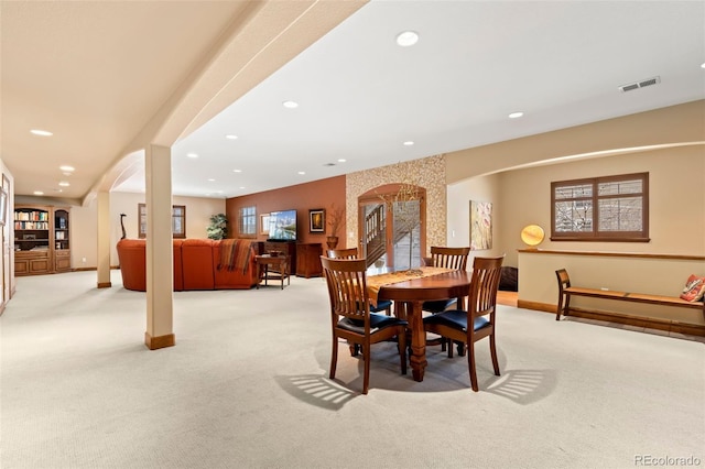 dining area with light carpet