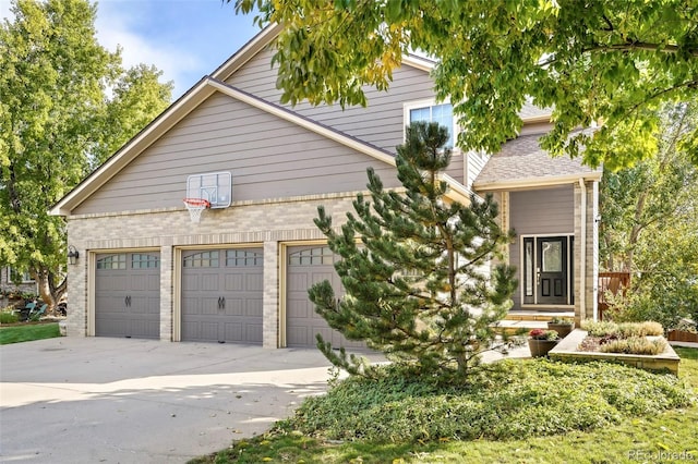 view of front of property featuring a garage