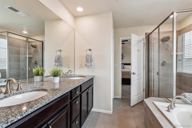 bathroom with vanity, separate shower and tub, and tile patterned flooring