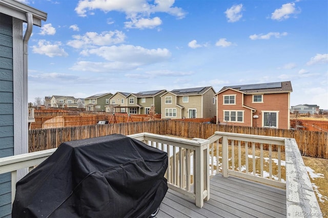 wooden terrace with grilling area