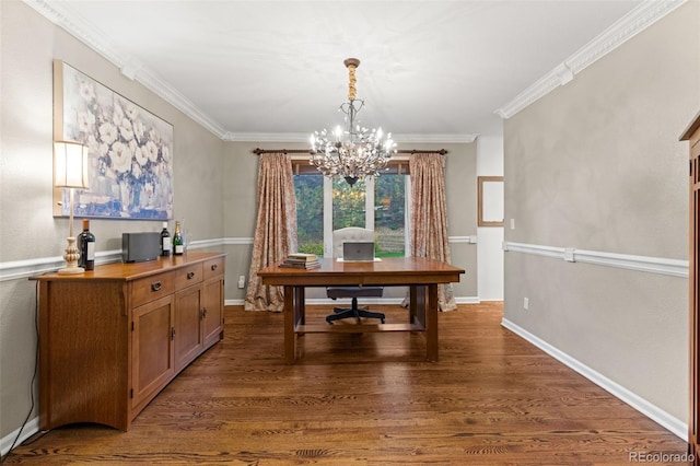 office space with ornamental molding, baseboards, and wood finished floors