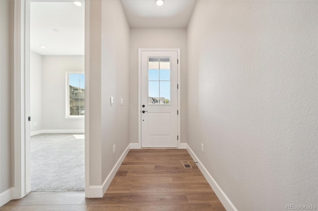 entryway with light hardwood / wood-style floors