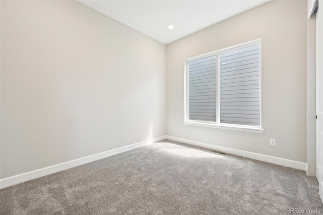 view of carpeted spare room