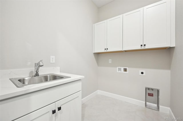 laundry room with cabinets, washer hookup, sink, and electric dryer hookup