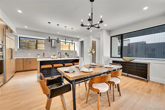 1029 9th St, Boulder, CO 80302 - dining space with light wood-style flooring, a chandelier, recessed lighting, and radiator heating unit