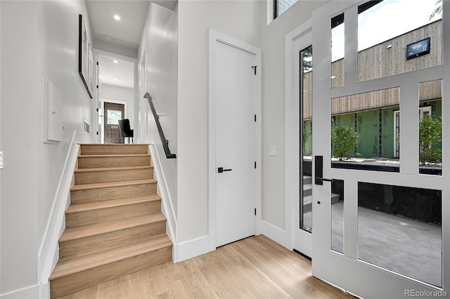 1029 9th St, Boulder, CO 80302 - entrance foyer featuring stairway, wood finished floors, and recessed lighting