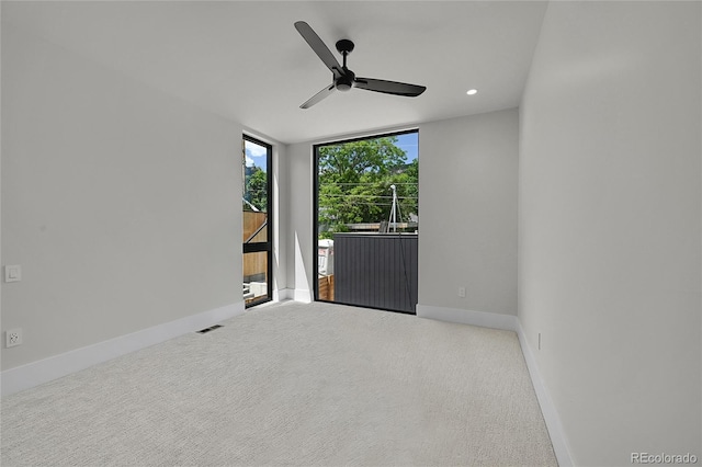 1029 9th St, Boulder, CO 80302 - carpeted empty room with a ceiling fan and recessed lighting
