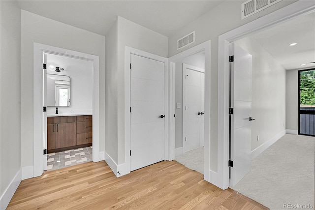 1029 9th St, Boulder, CO 80302 - corridor featuring light wood-style flooring and baseboards