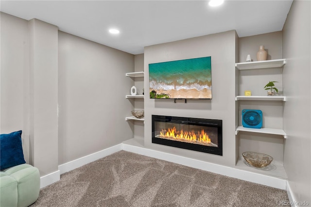 8060 Stuart Pl, Westminster, CO 80031 - living area with carpet floors, a glass covered fireplace, and recessed lighting
