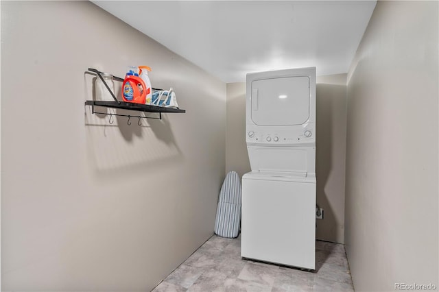 8060 Stuart Pl, Westminster, CO 80031 - washroom featuring stacked washer and clothes dryer