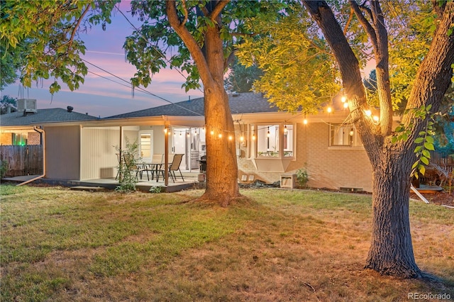 8060 Stuart Pl, Westminster, CO 80031 - view of front of home featuring a patio area and brick siding