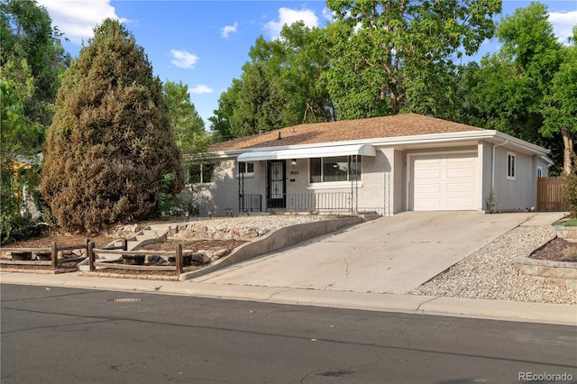 8060 Stuart Pl, Westminster, CO 80031 - ranch-style home with an attached garage and driveway
