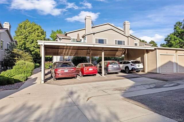 3857 Mossy Rock Dr Unit 201, Highlands Ranch, CO 80126 - view of covered parking lot
