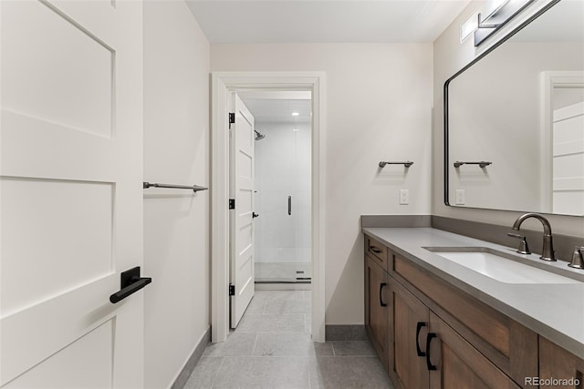 bathroom with vanity and walk in shower